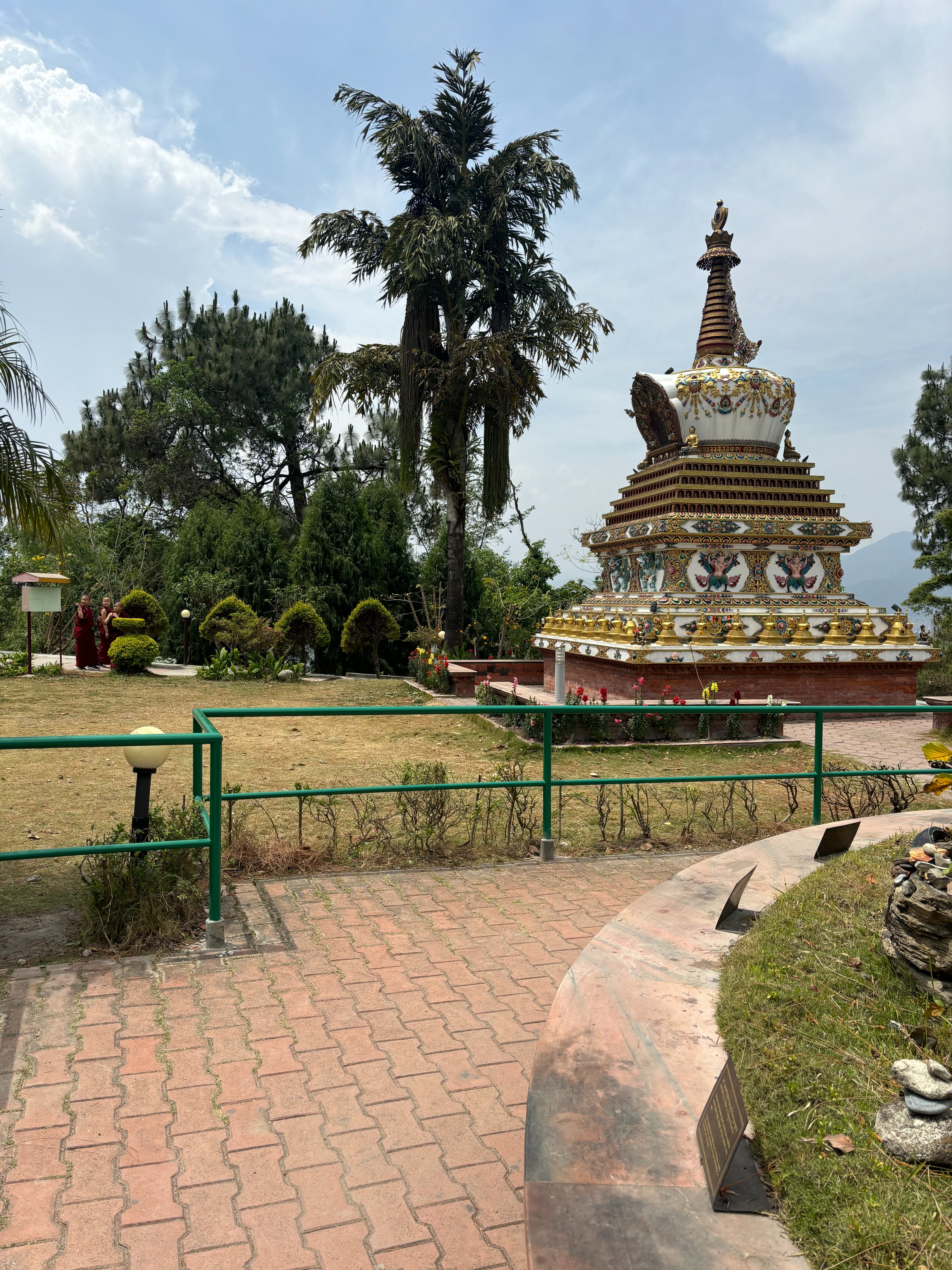 A stone shrine of the seated Buddha, Nepal